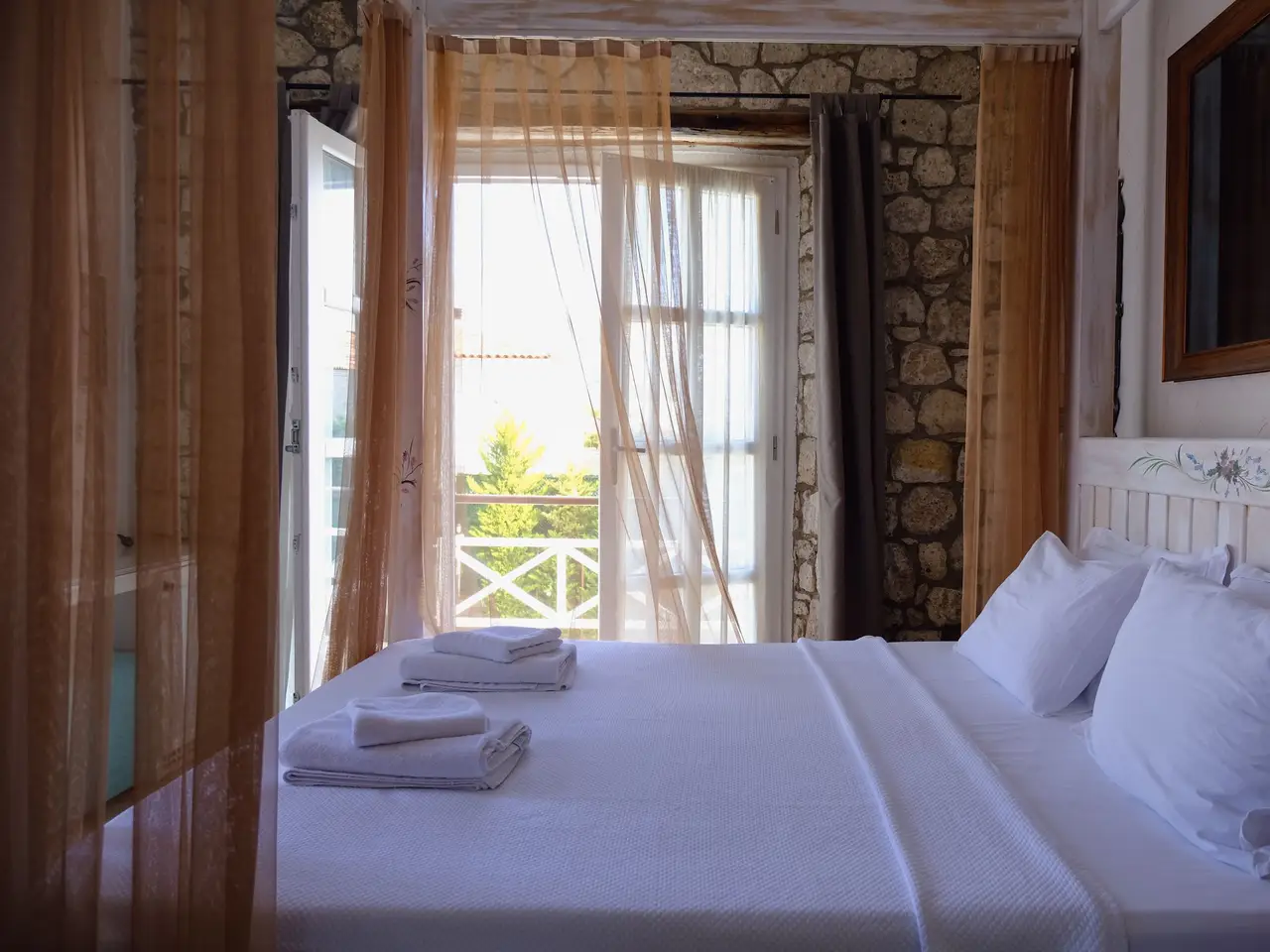 Guest room with quilt and window