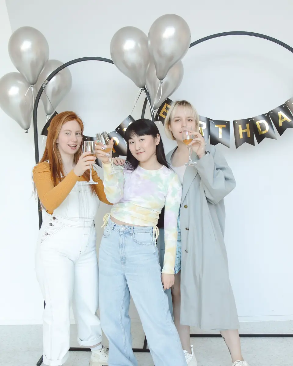 Friends raising a birthday toast