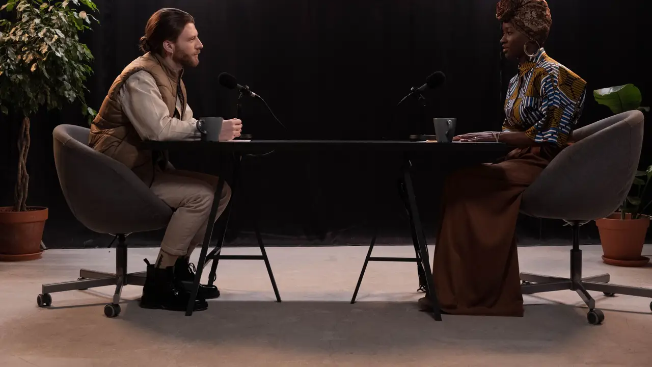 Brand strategists recording a client interview in a studio