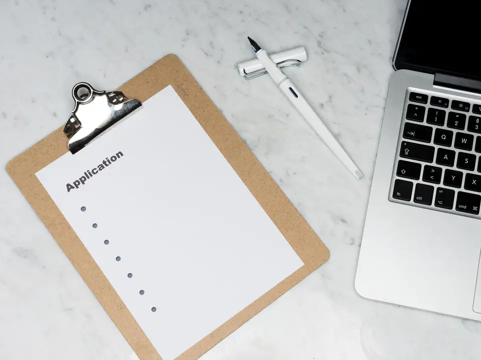 Job application form on a clipboard