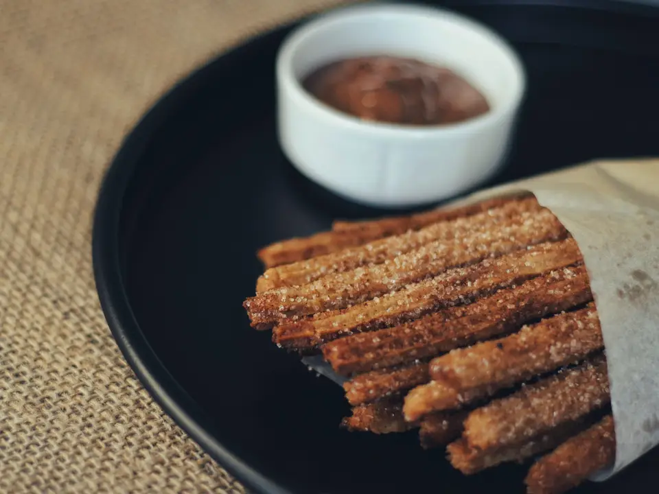 Churros, piloncillo dip