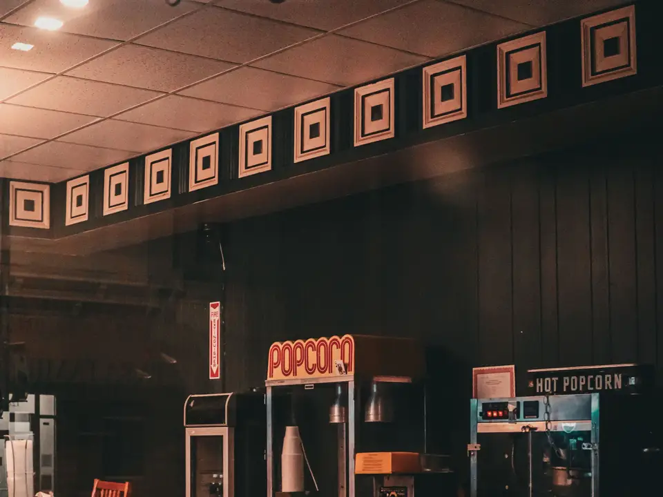 Retro cinema concession stand with a popcorn machine
