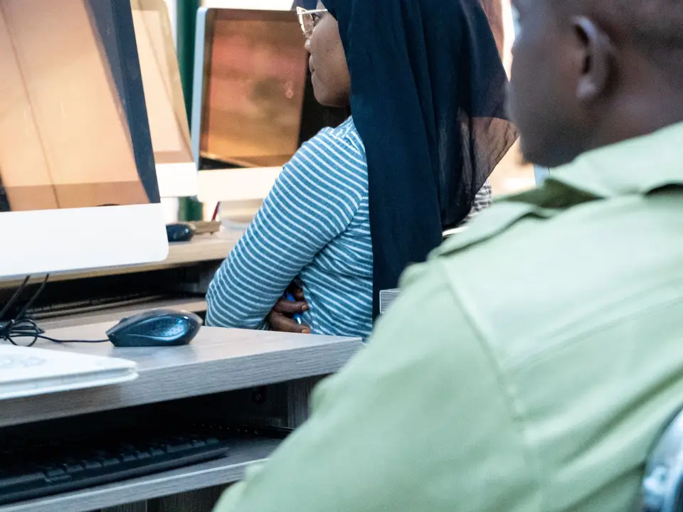 Students coding in a modern computer lab