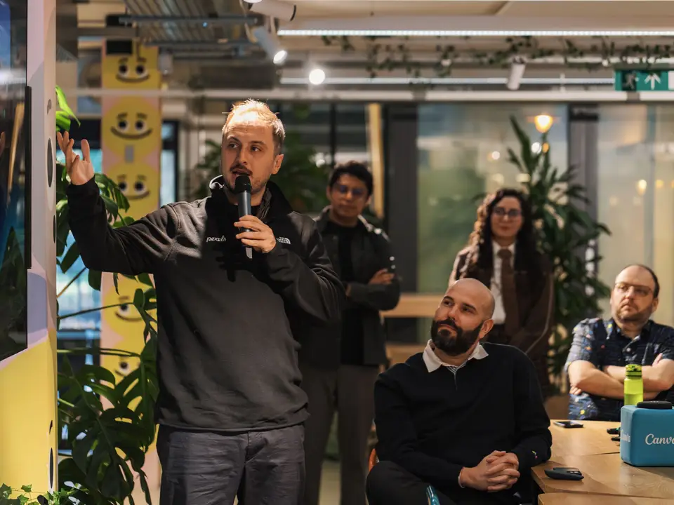 Presenter speaking to colleagues