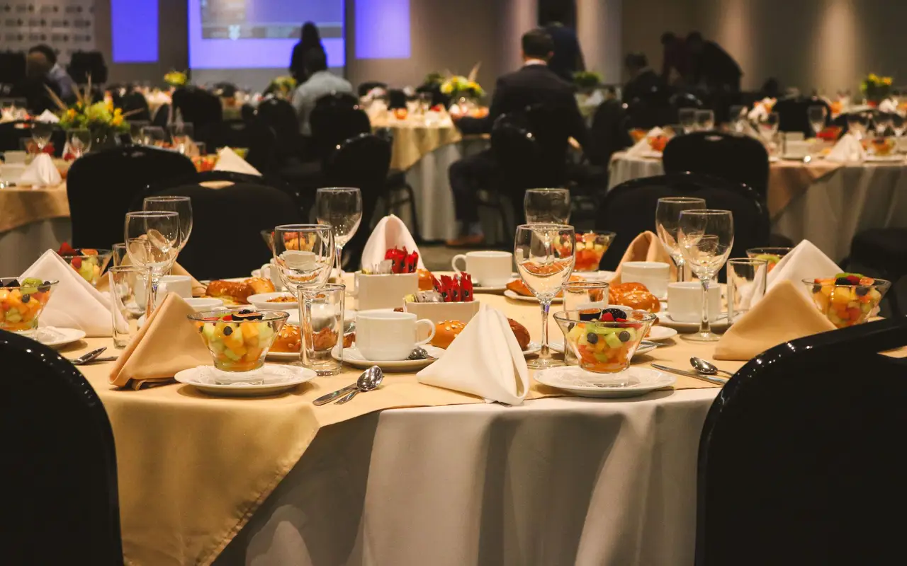Banquet hall set for a company dinner