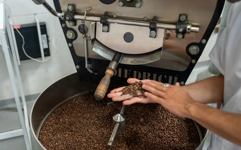 Coffee bar with espresso machine and pastries