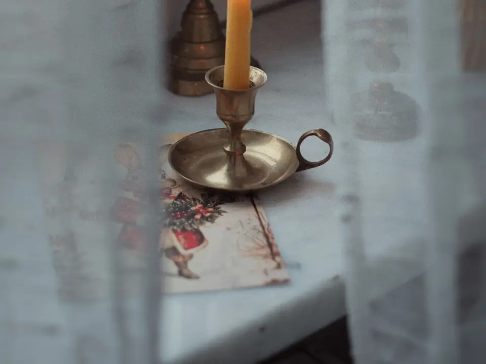 Jar lantern charging on a sunny windowsill