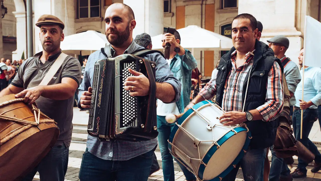 Street musicians playing accordion and drum at a cultural festival