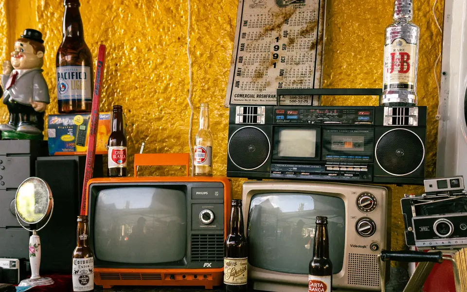 Vintage televisions and receivers in the back room