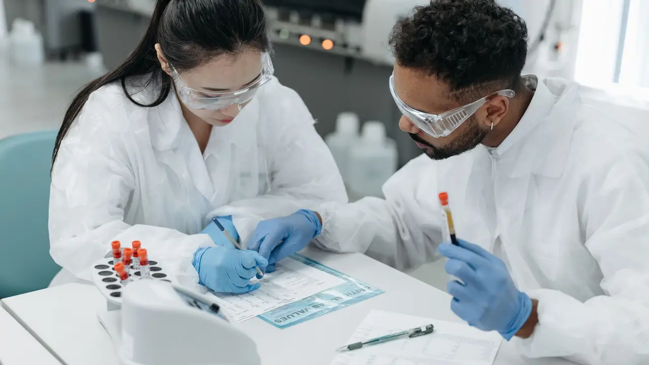 Clearwater lab staff preparing water samples at the bench