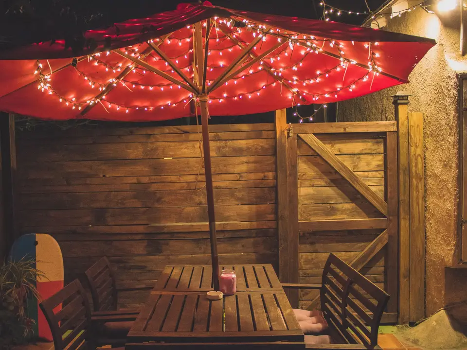 Patio table under string lights