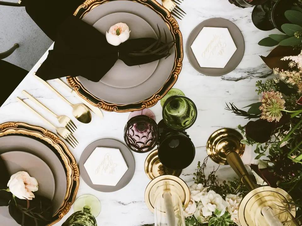 Table set with gold chargers