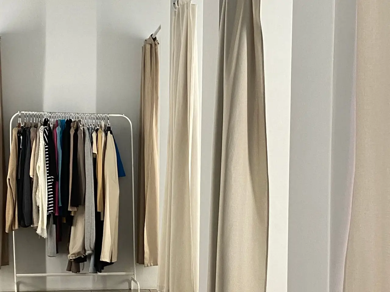 Rack of formal dresses in a rental boutique