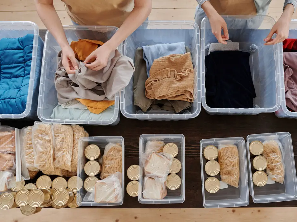 Donated food sorted into bins by category