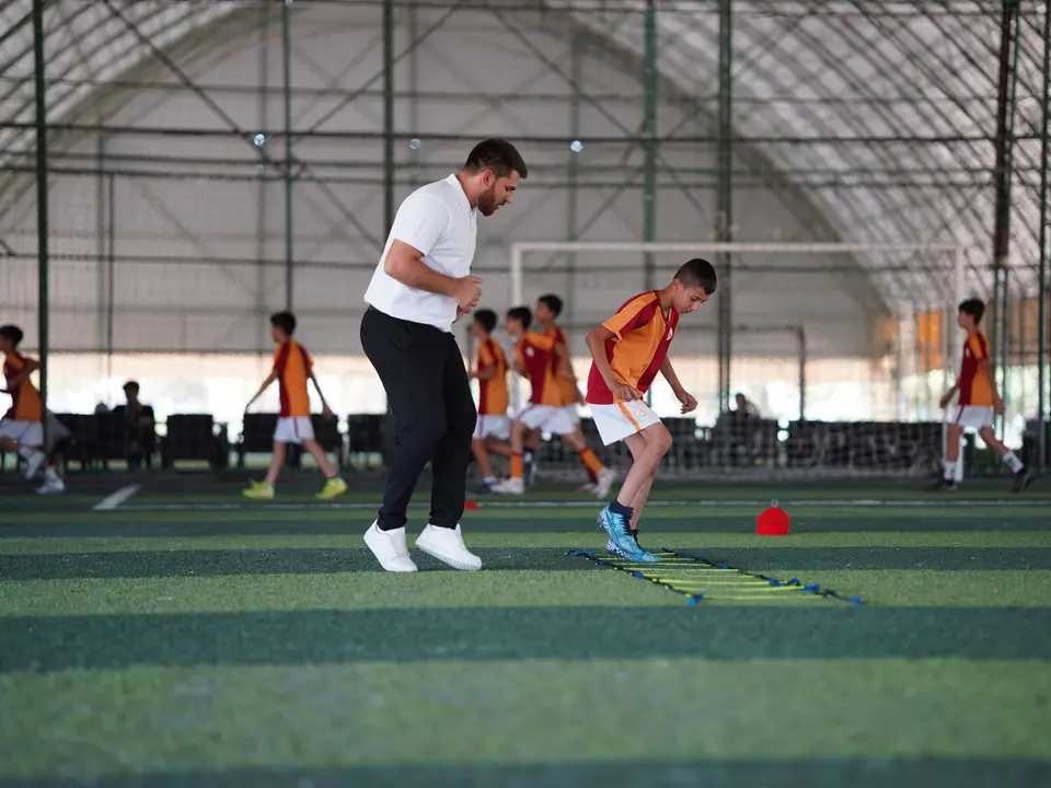 Indoor sports dome with football training cones