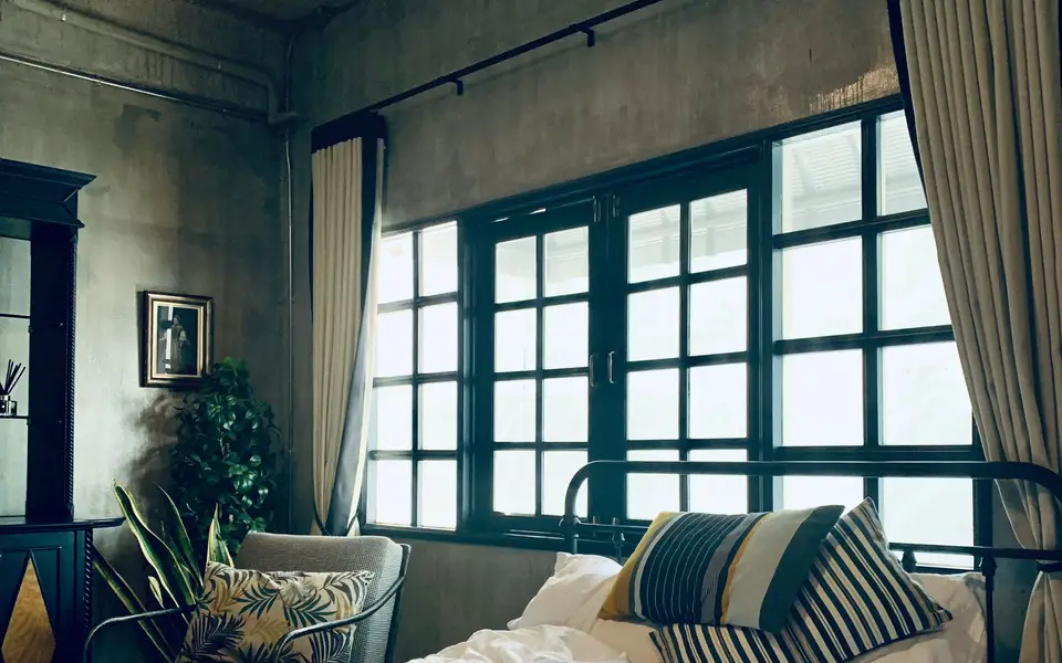 Cozy living room with candles and textiles