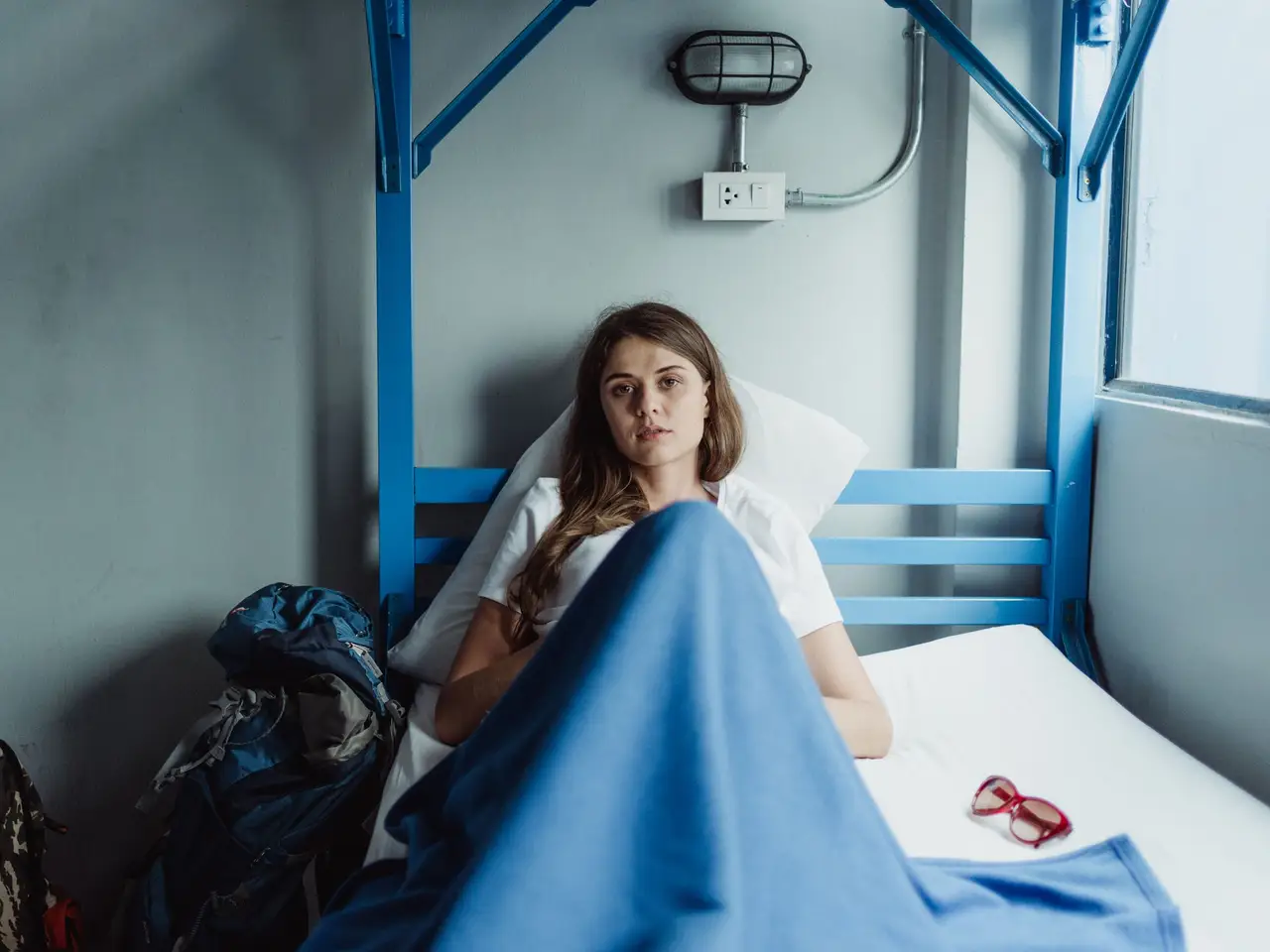 Bunk beds with curtains in a dorm