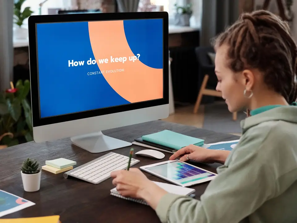 Recruiter comparing applicant metrics on a tablet