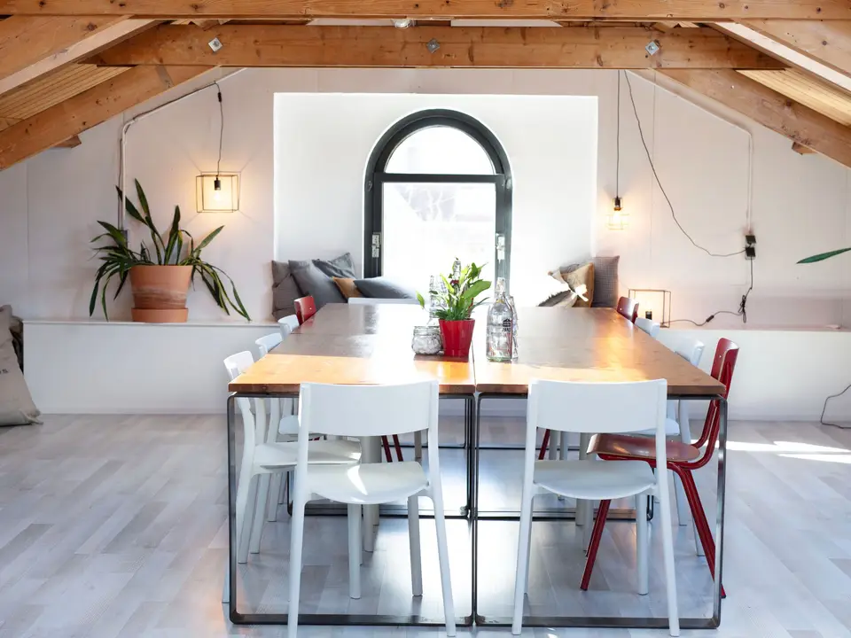 Large island with pendants over a bright open kitchen