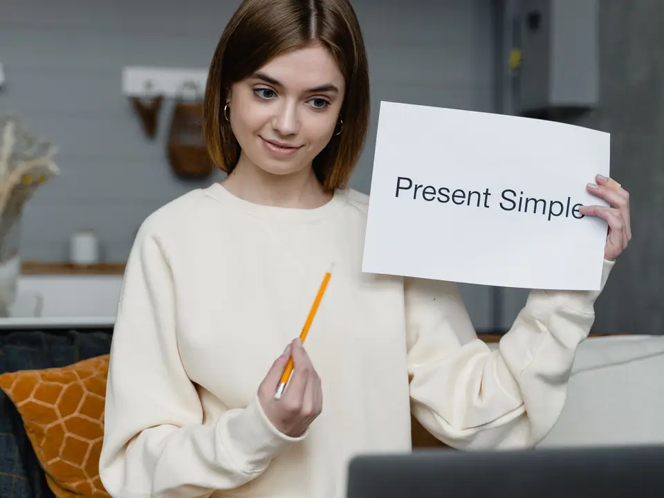 Woman teaching English online on a video call