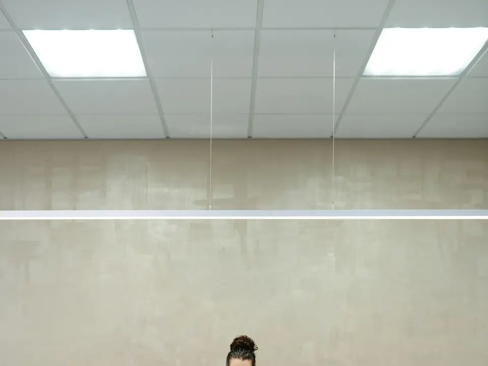 Receptionist at a sleek modern front desk