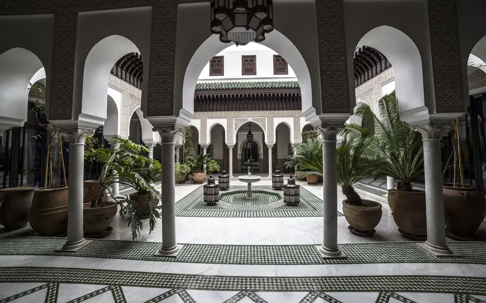 Courtyard fountain inside a walled estate