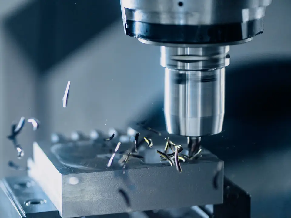 Machined metal components laid out on a inspection bench