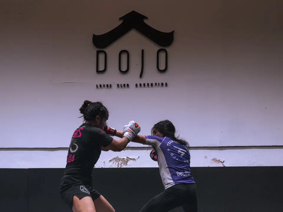 Self-defense class practicing blocks