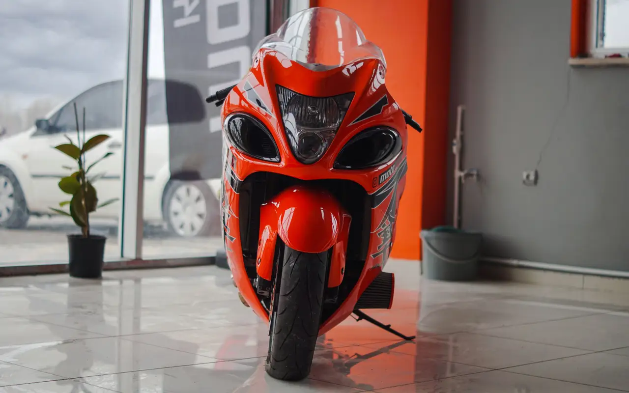 Motorcycles lined up in a showroom