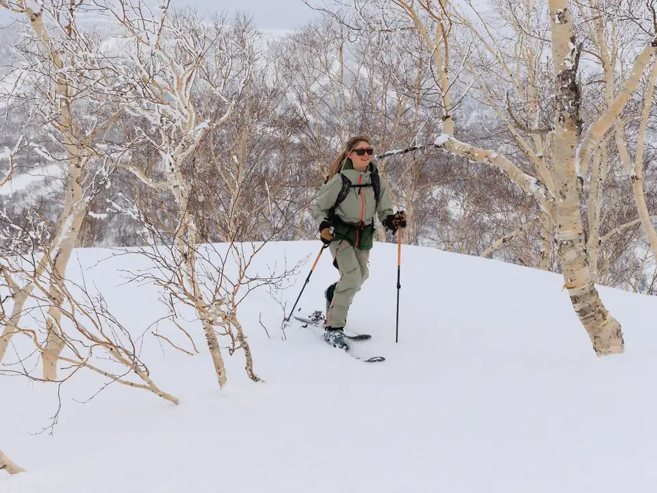 Snowshoers on mountain trail at dawn