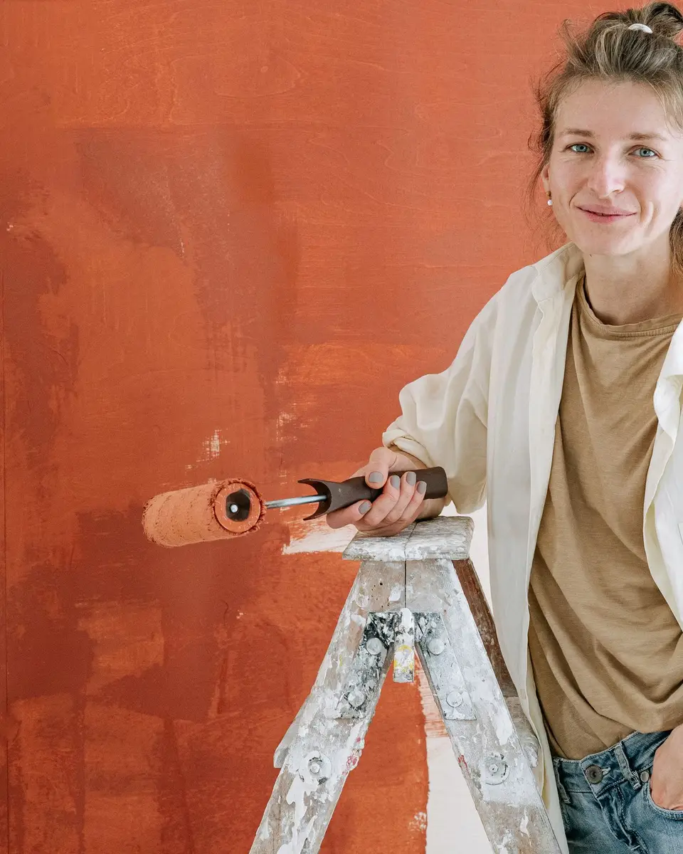 Painting a wall with a roller