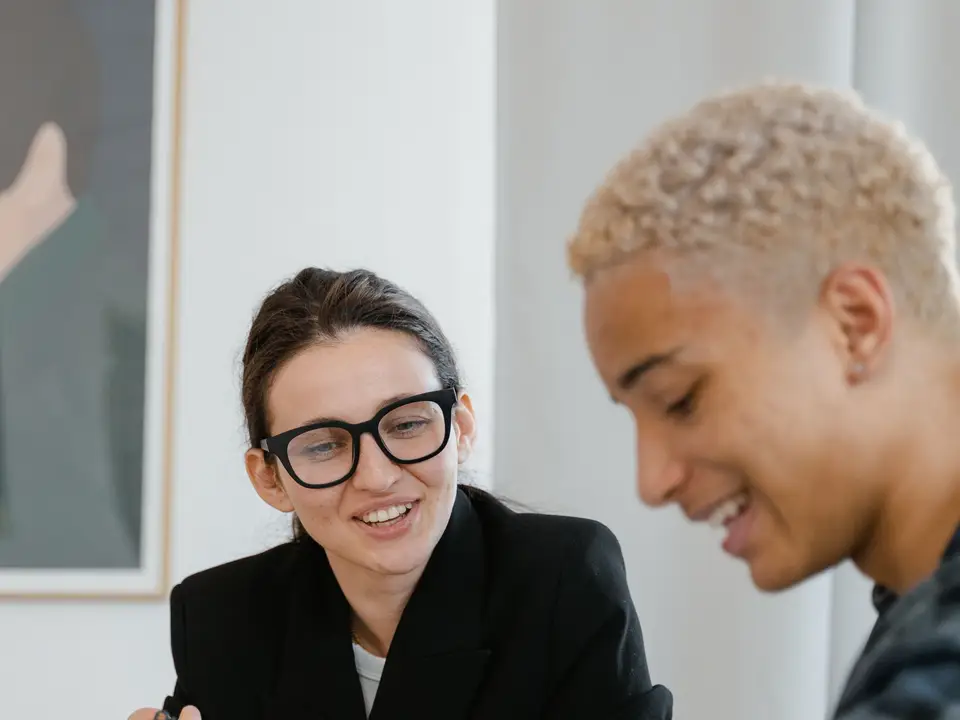 Tutor instructing a student at home