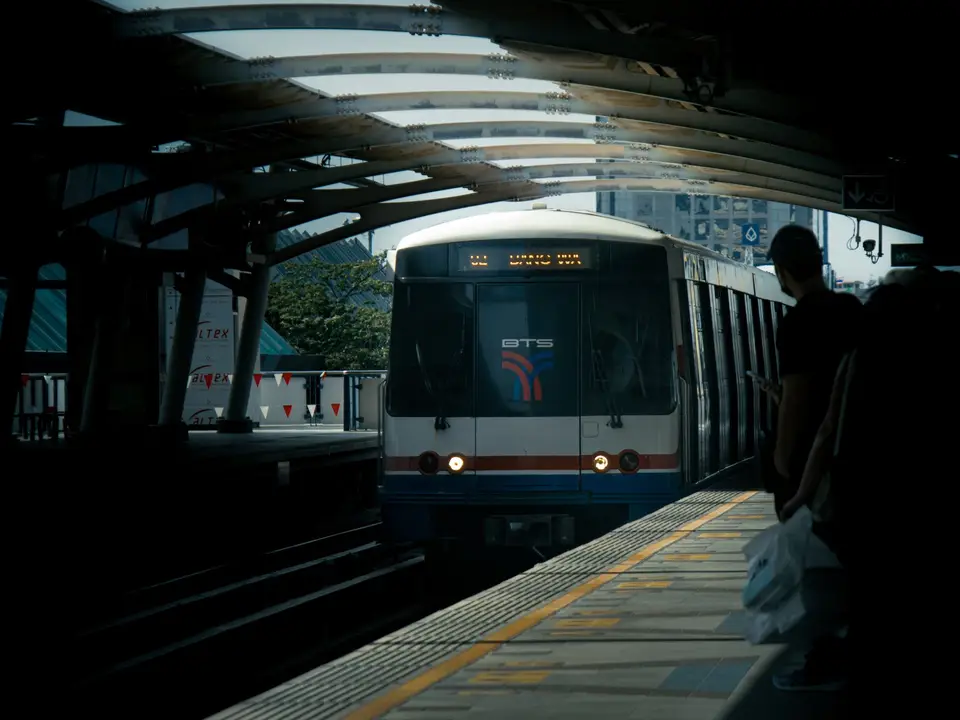 Metro train arriving at a station platform