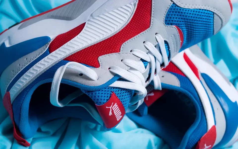 Sneaker upper being assembled on a last
