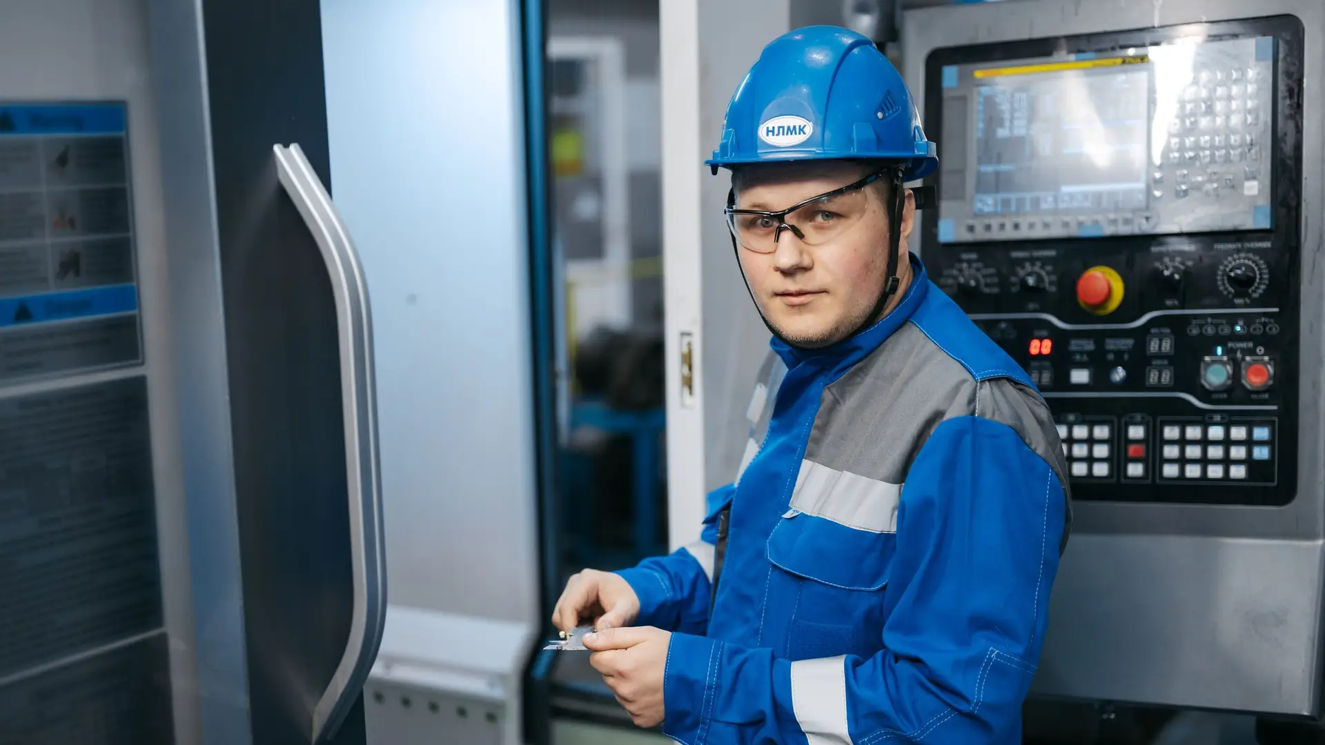 Factory engineer in hard hat on the plant floor