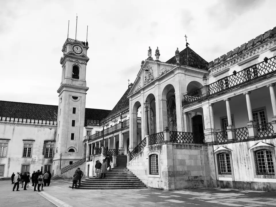 University of Coimbra clock tower in black and white