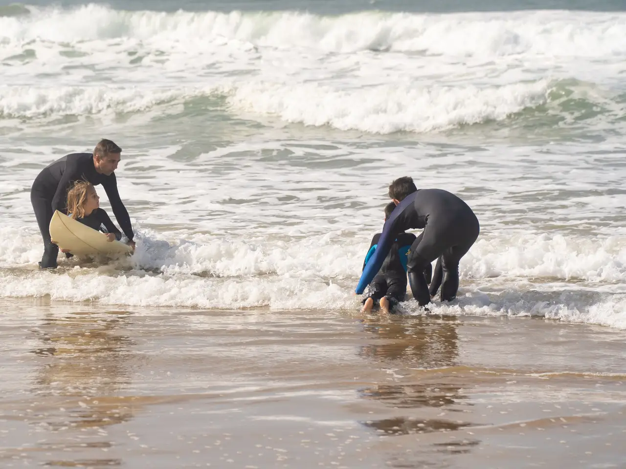 Surfer riding a green wave