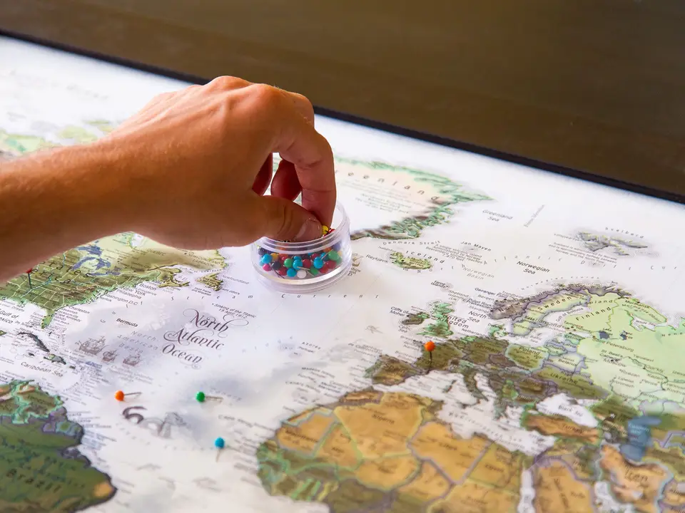 Designer marking a paper map