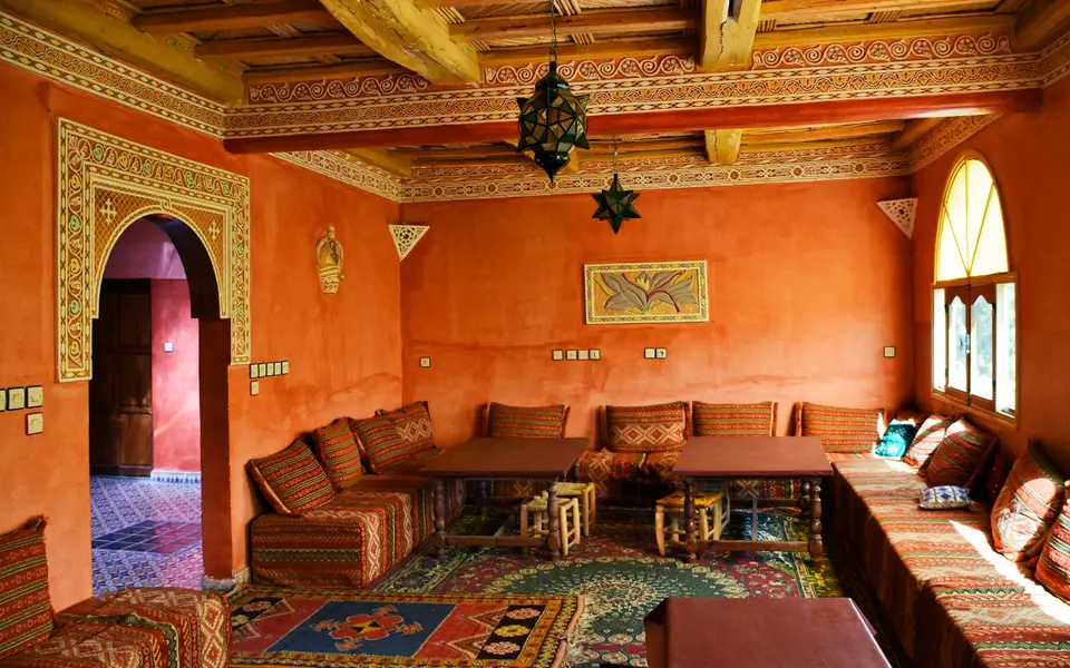 Living room with coastal decor and large windows