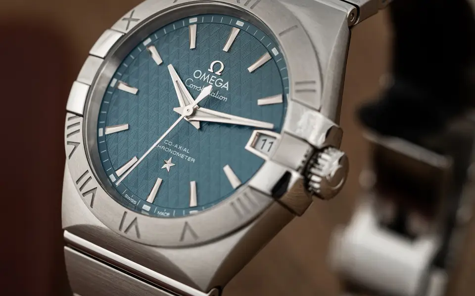 Watch dial detail with luminous hands