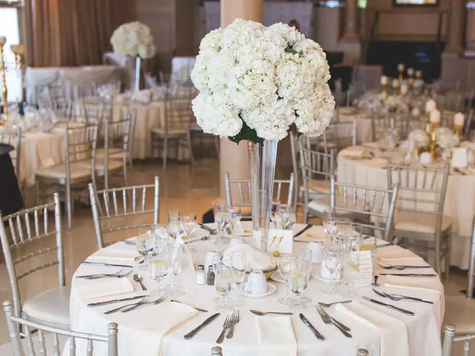Reception table with a floral centrepiece