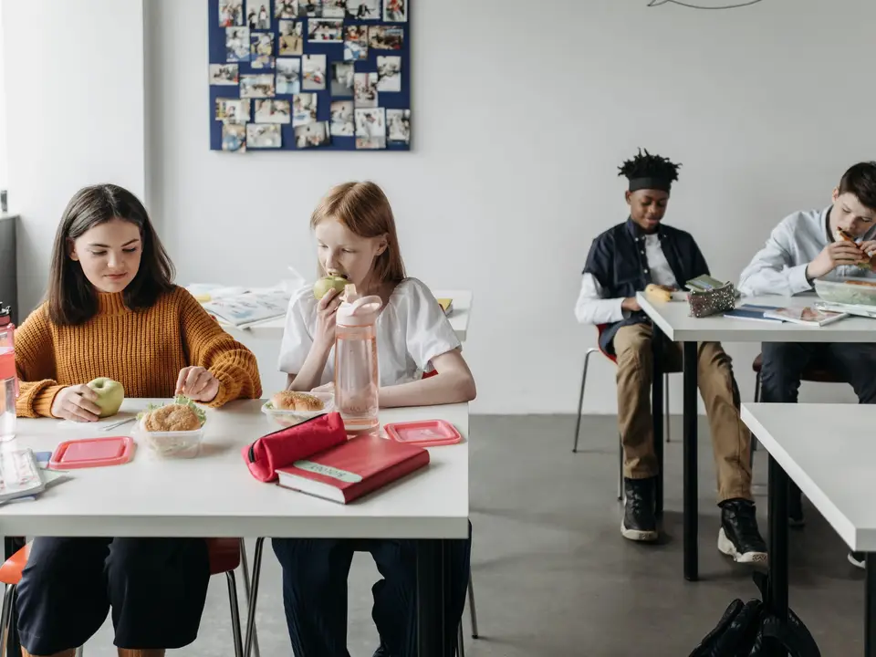 Teens doing homework together at an after-school club